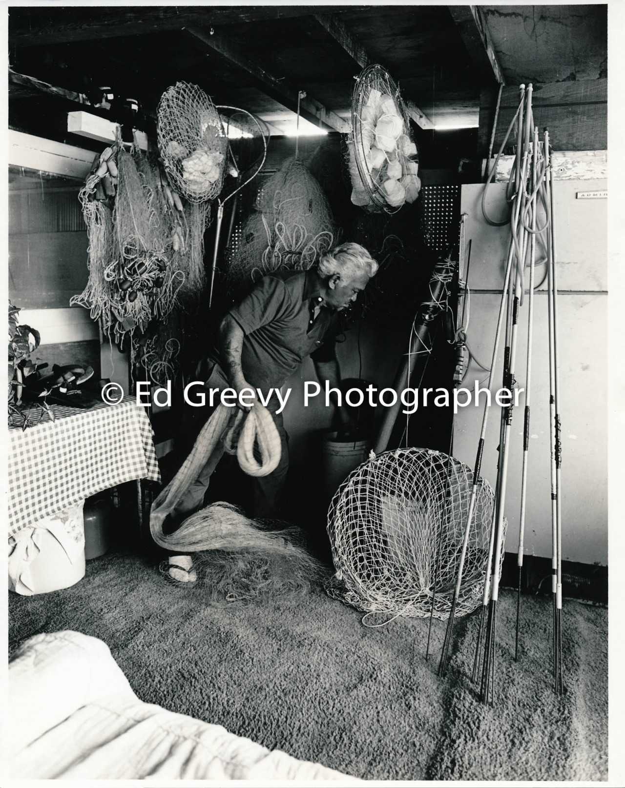 Clement Apollo in his Sand Island home with his nets (11 November 1979) Negative: 4091-5-12 | Ed Greevy Photographer