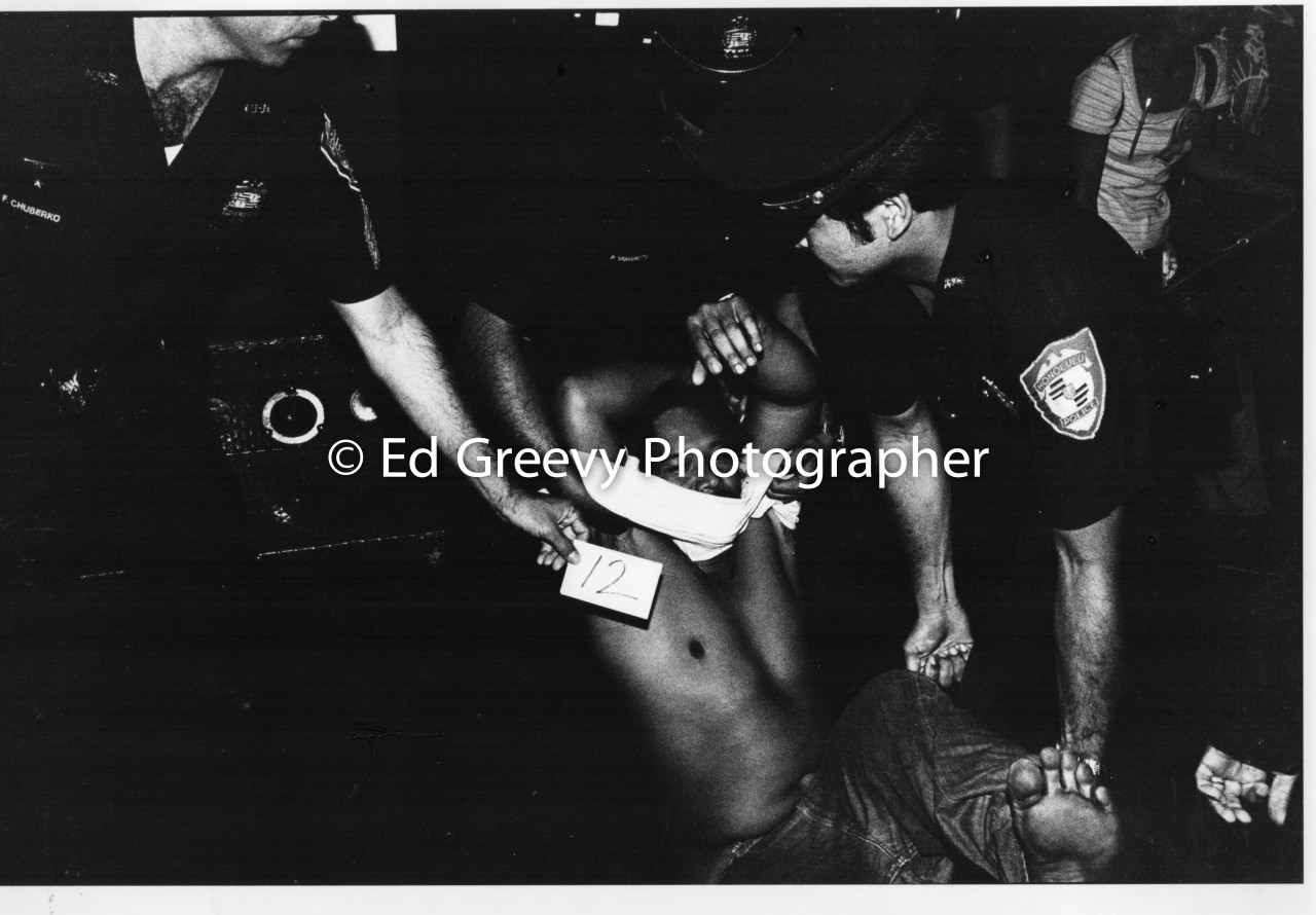 Hawaiian sovereignty activist Soli Niheu is dragged and later arrested from DHCD office after PACE eviction protest demo occupation. (13 March 1978) Negative: 4019-3-5 | Ed Greevy Photographer