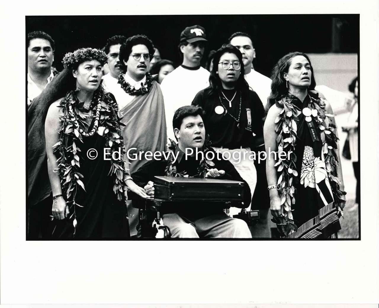Mililani Trask, Kanalu Young, and Haunani-Kay Trask lead Ka Lahui march to Iolani Palace protest of the overthrow.    (17 January 1993) Negative: 7085 | Ed Greevy Photographer