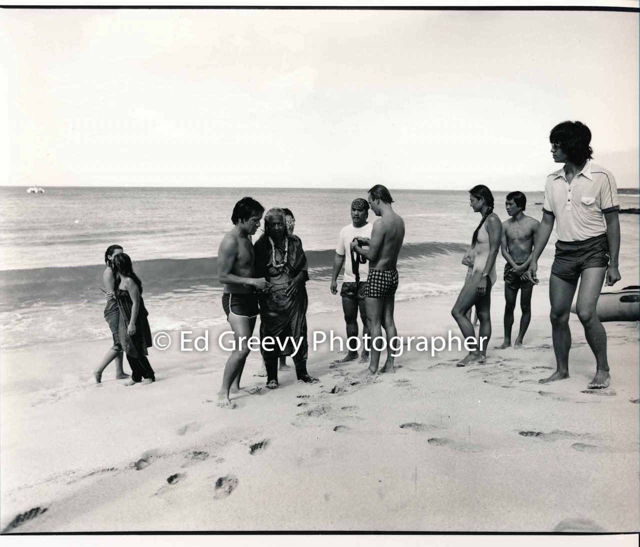 Aunty Emma DeFries is welcomed ashore on Kahoʻolawe by Frank Hewett and Rell Sunn | Ed Greevy Photographer