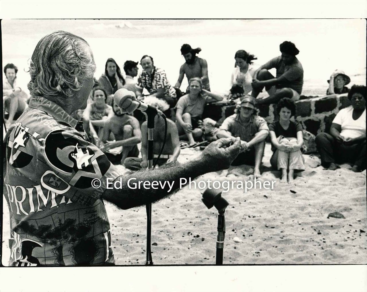 Kalama Valley pig farmer, George Santos, testifies at Save Our Surf protest of proposed major urban development at Wawamalu (Sandy Beach).  (23 April 1972) Negative: 2560-3-21 | Ed Greevy Photographer