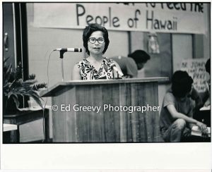 Heʻeia Meadowland resident Jo Patacsil supports Waiahole-Waikane residents at State Land Use Commission re-zoning hearing (21 October 1974) Negative: 2752-3-27A | Ed Greevy Photographer