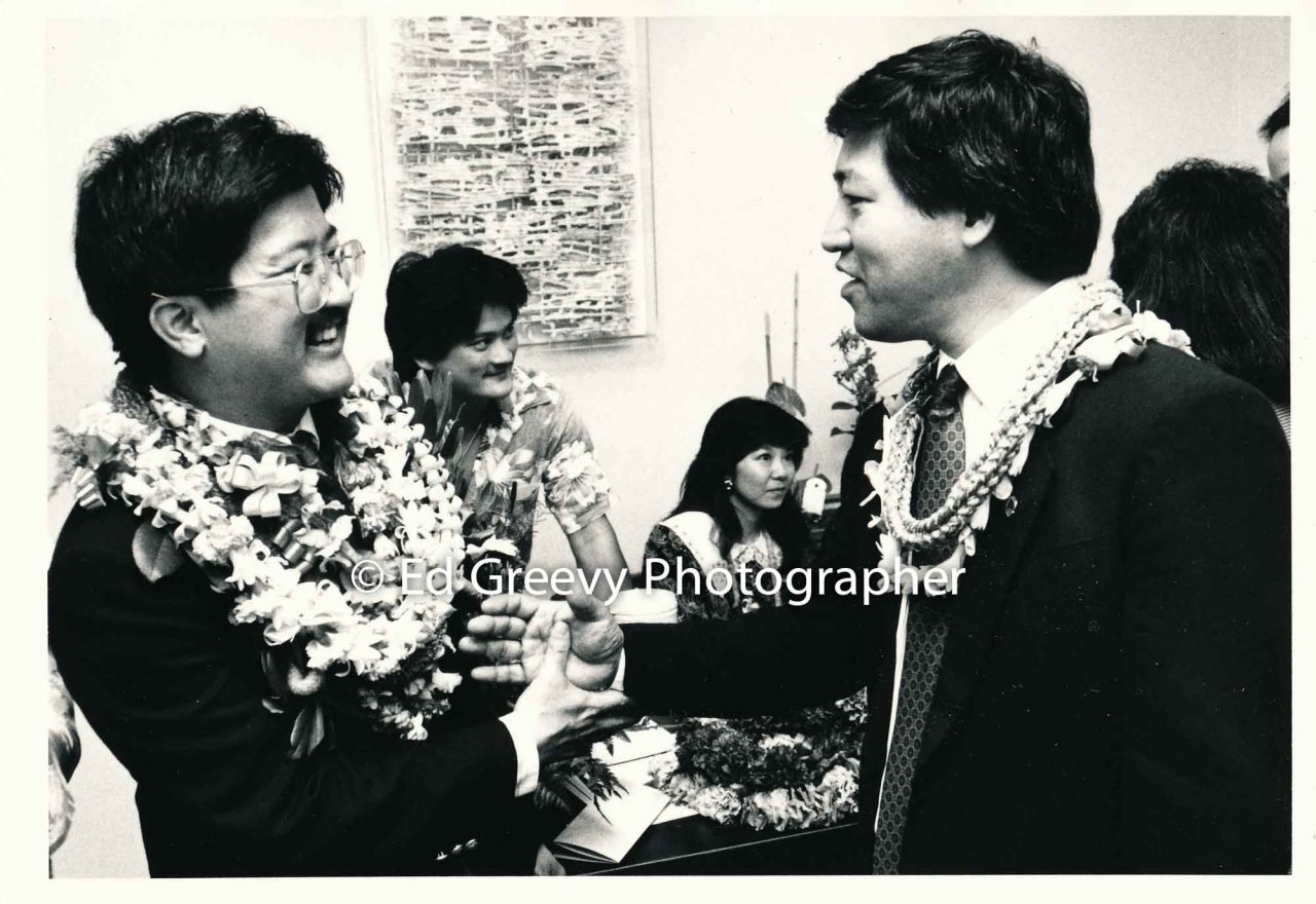 Roland Kotani (left) and supporter. 1989