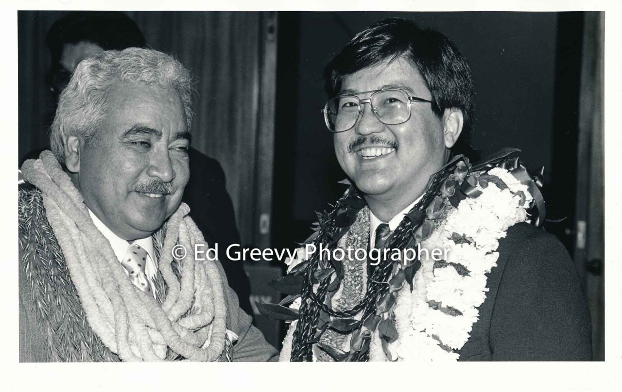 Roland Kotani (right) with State House member. 1988