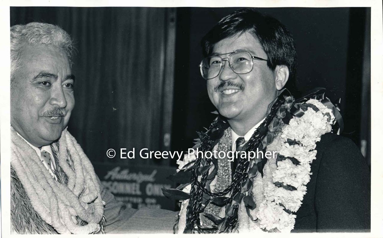 Roland Kotani (right) with State House member. 1988