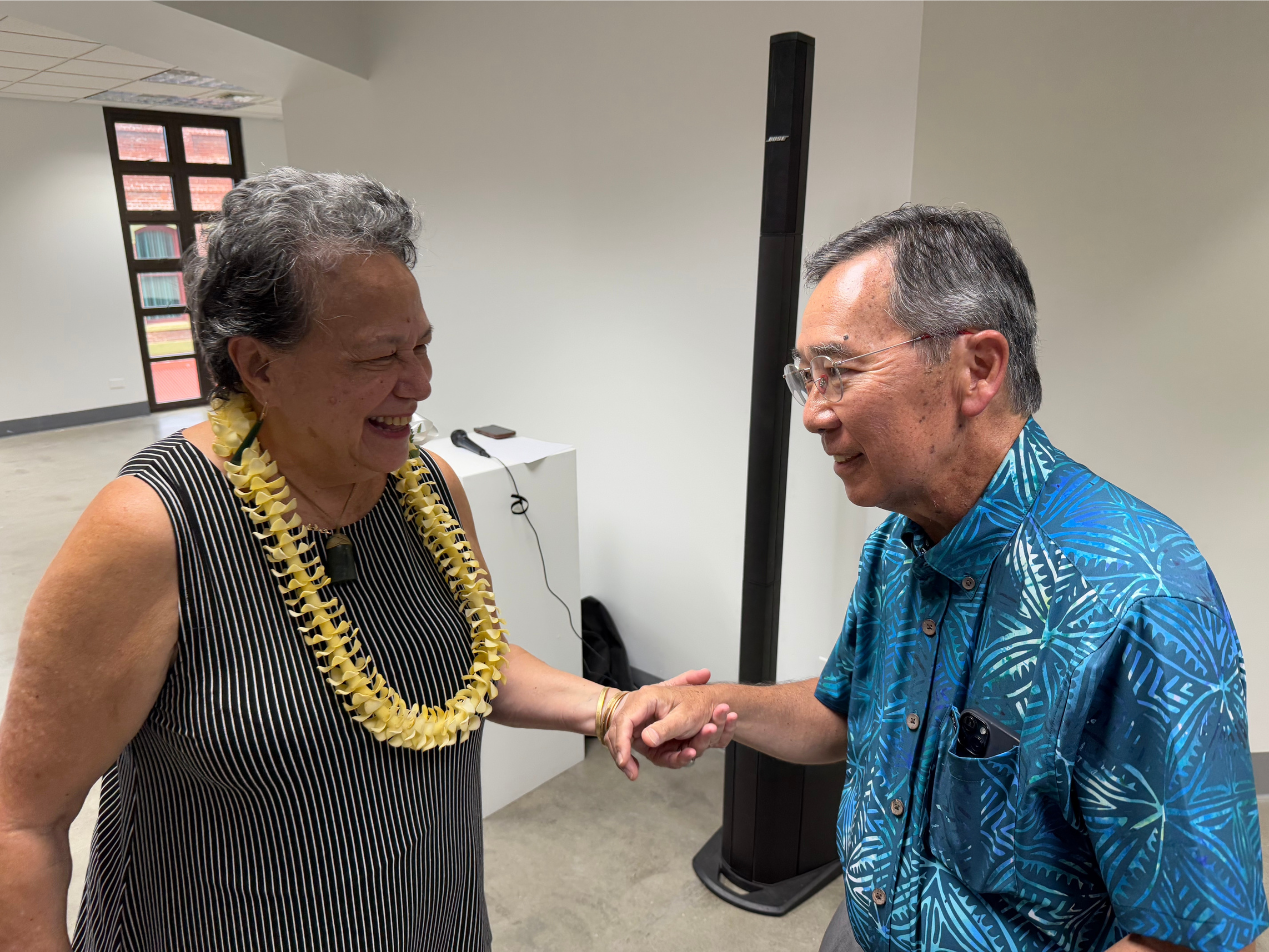 Haaheo Mansfield and Floyd Takeuchi greeting each other