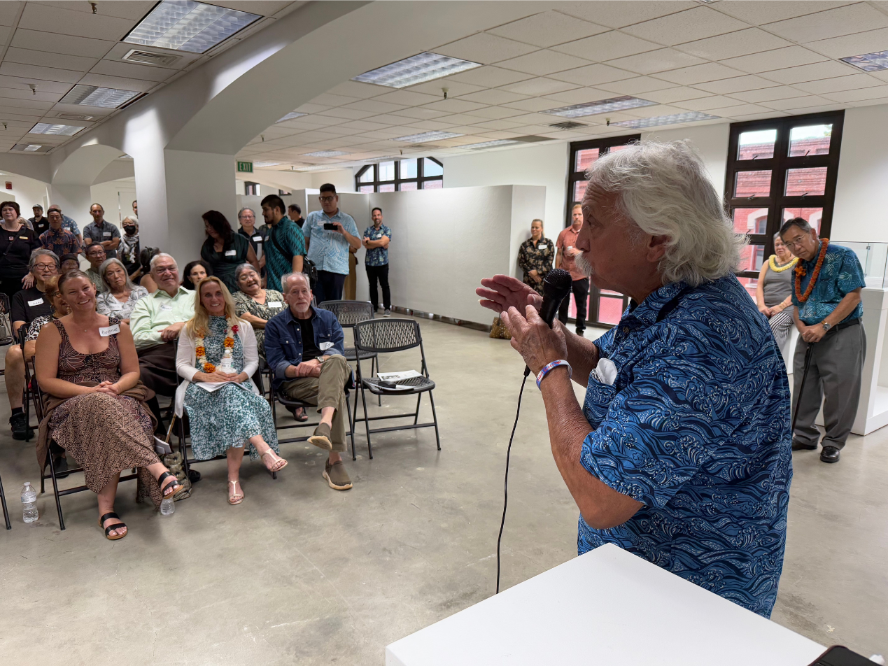 Macky Catania wanted the room to know my dad was a pretty good fast pitch softball pitcher.